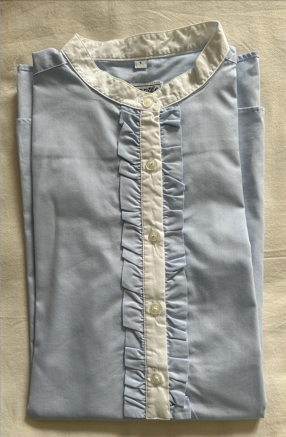 chemisier col rond patte de boutonnage volantée