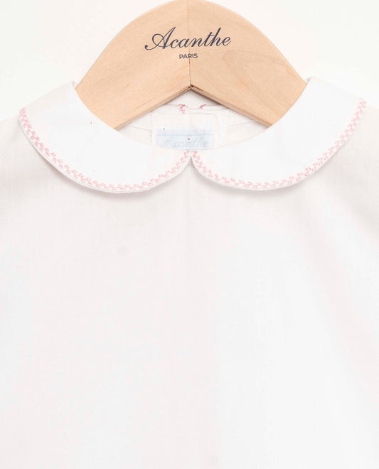 Chemisier col rond blanc liseré rose