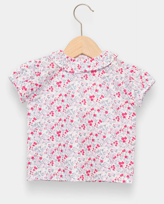 blouse col volanté fleur rose et bleue