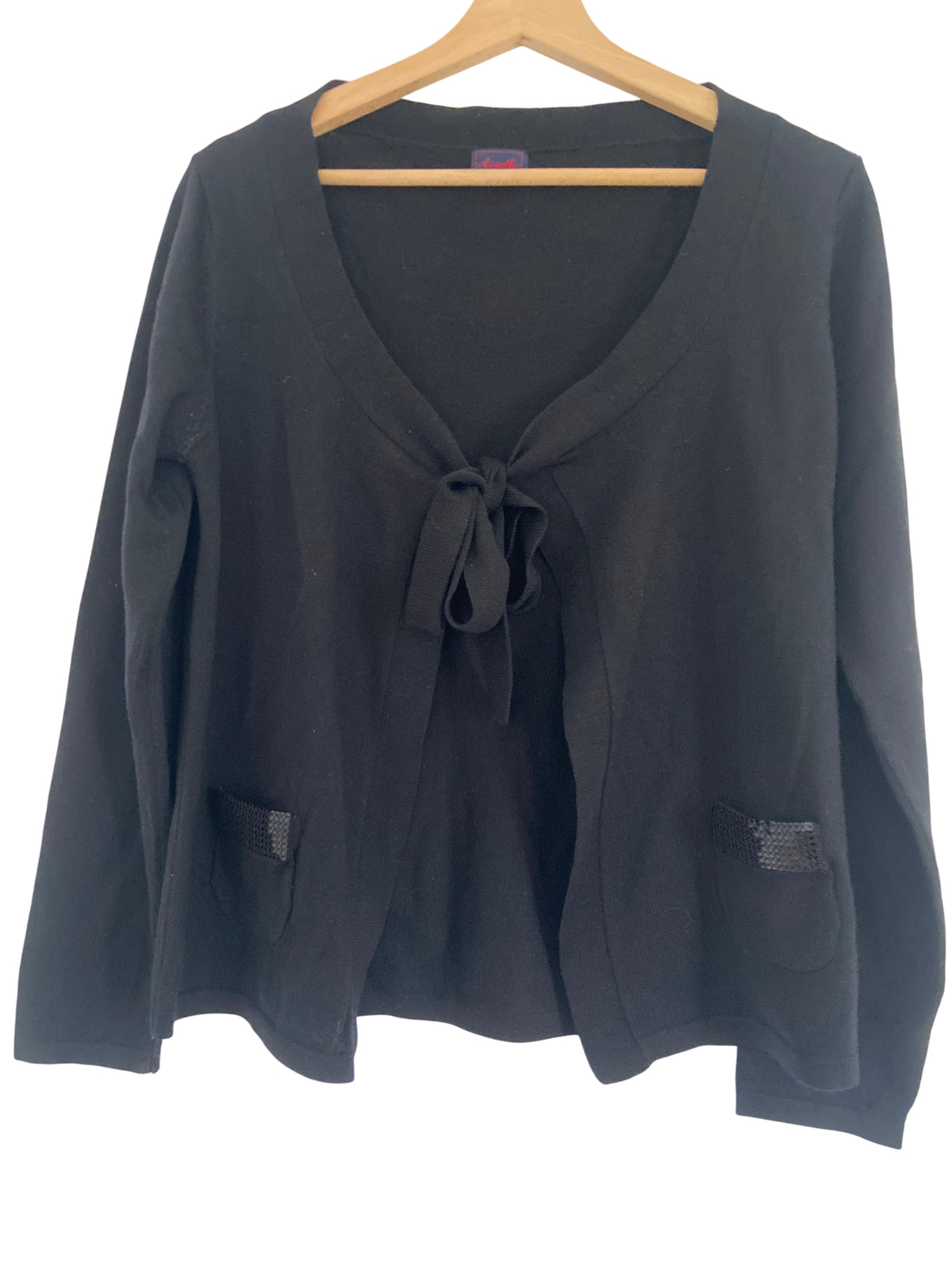 Gilet mérinos noir avec poches paillettes