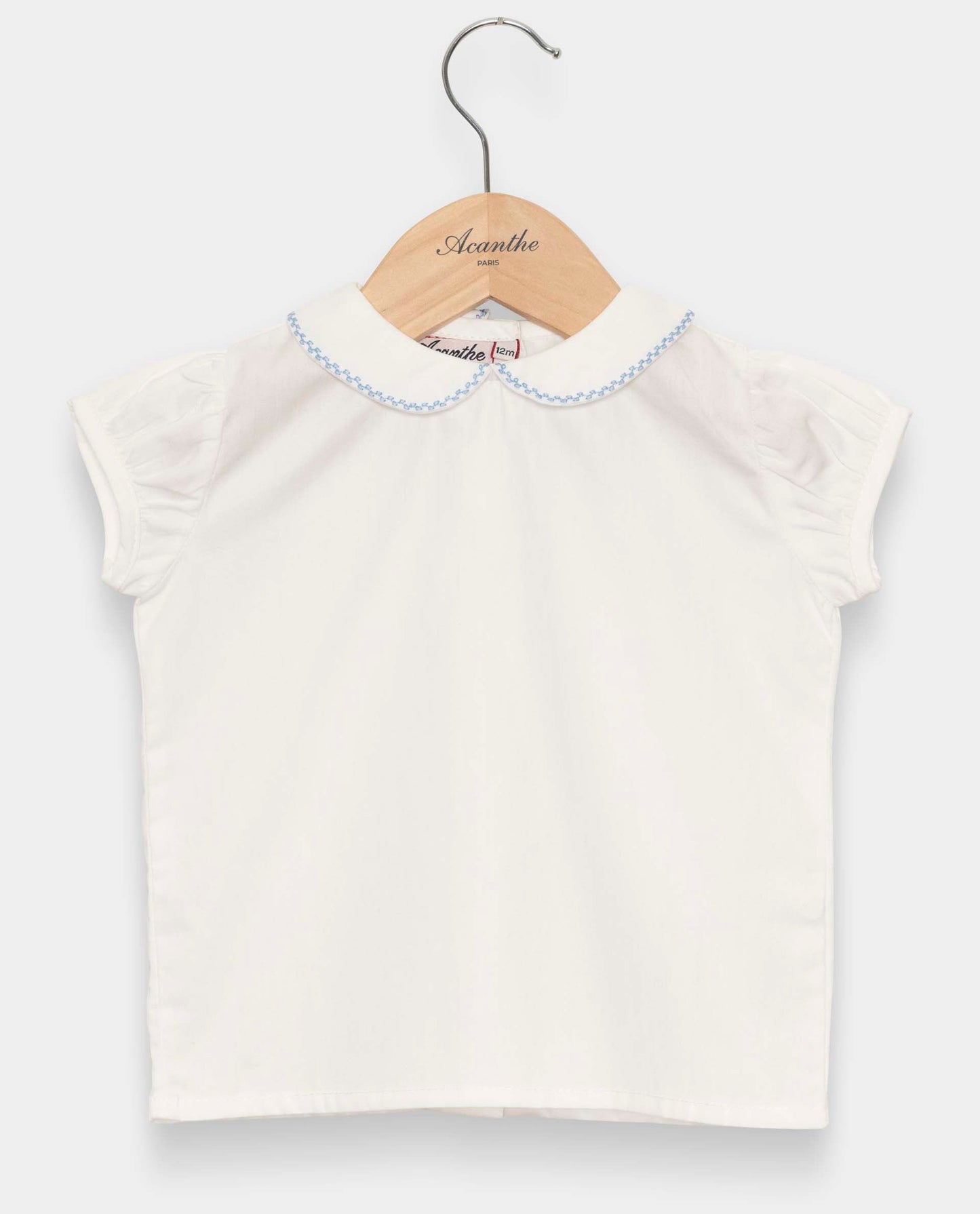 chemisier col rond btns dos mc blanc liseré ciel