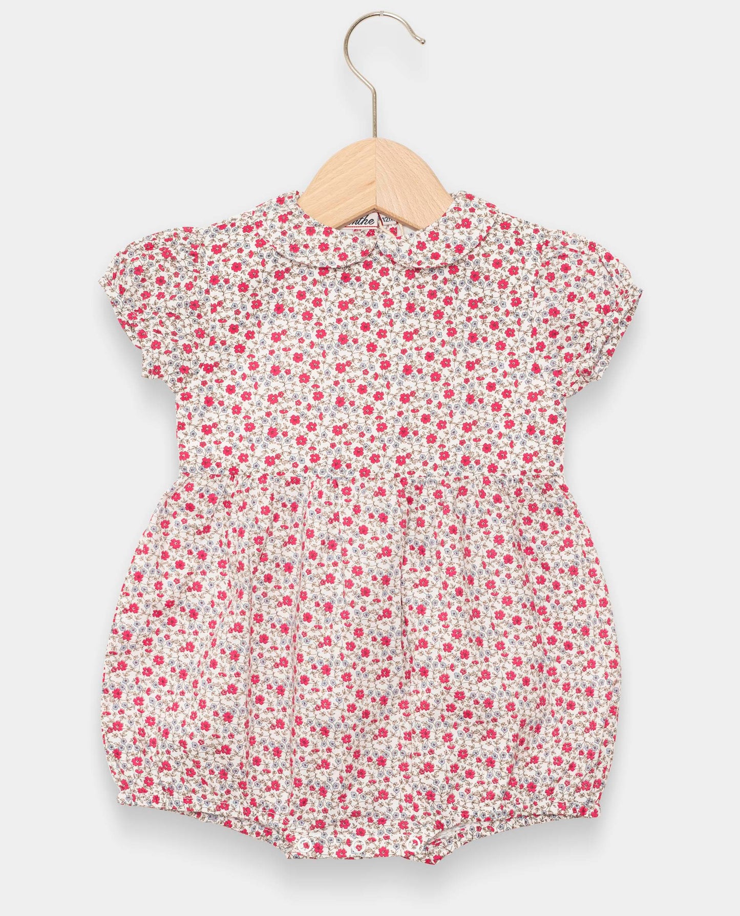 barboteuse col rond manches ballon imprimé fleur fushia