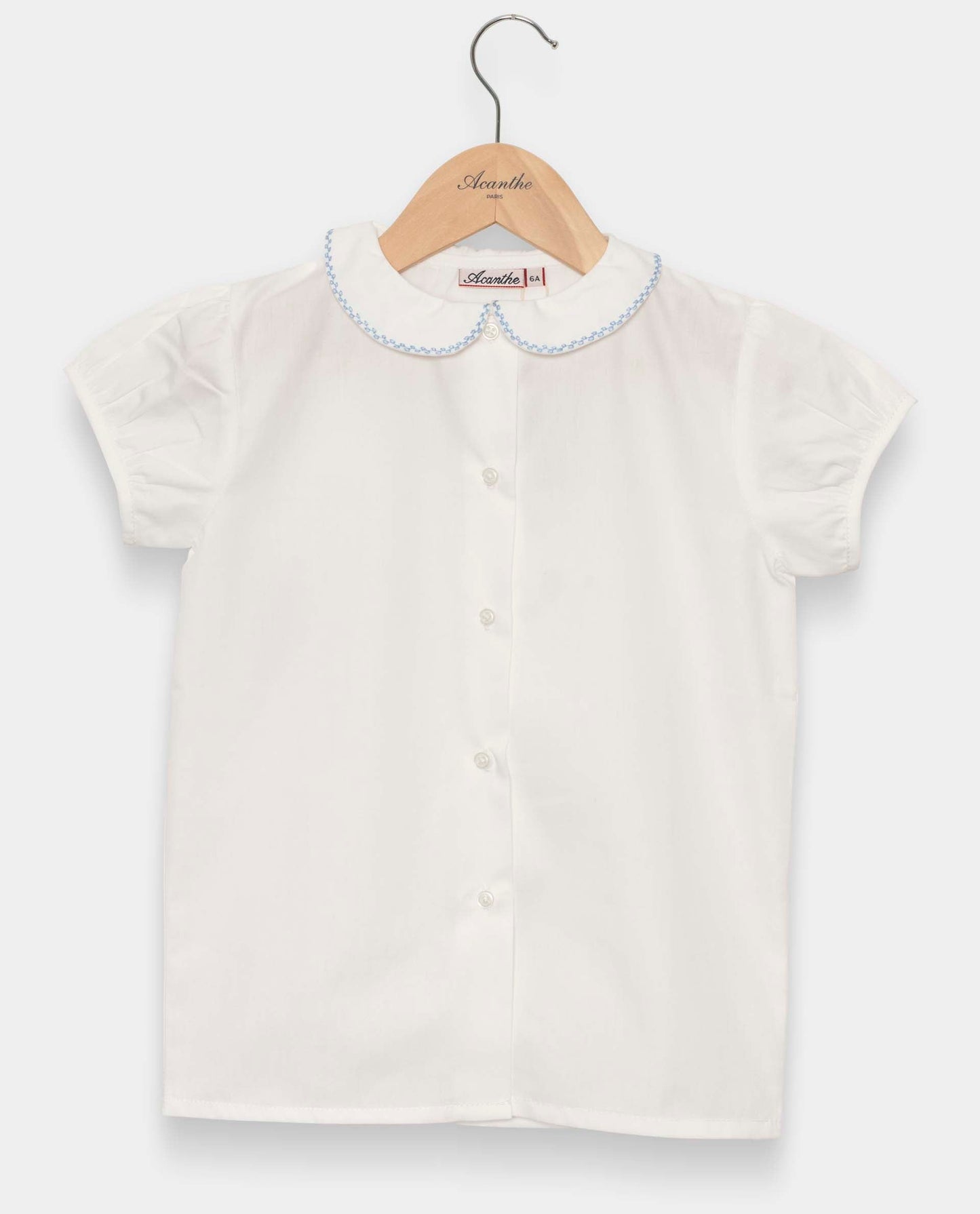 chemisier col rond manches ballon blanc liseré ciel