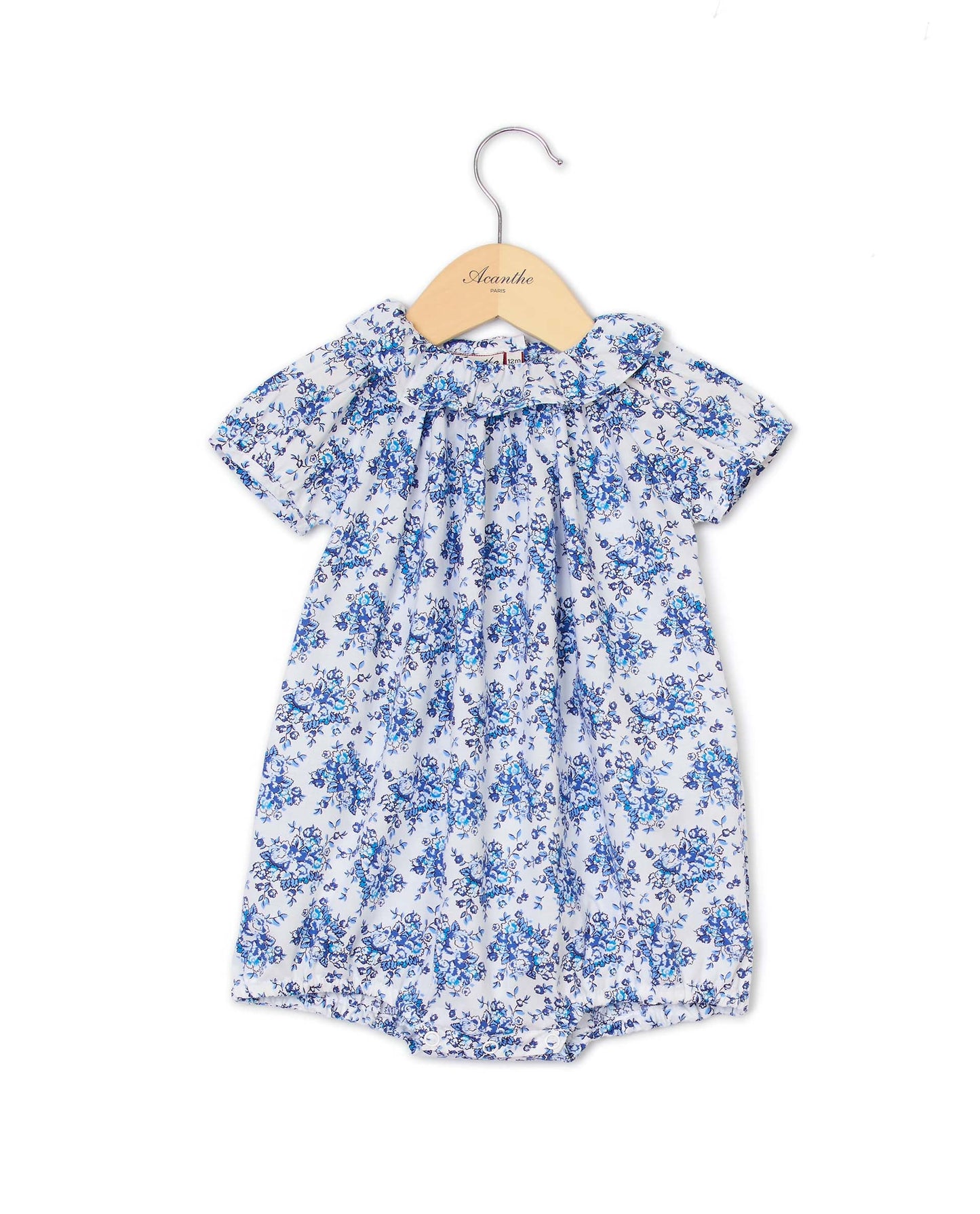 Barboteuse col volanté imprimé fleur bleue