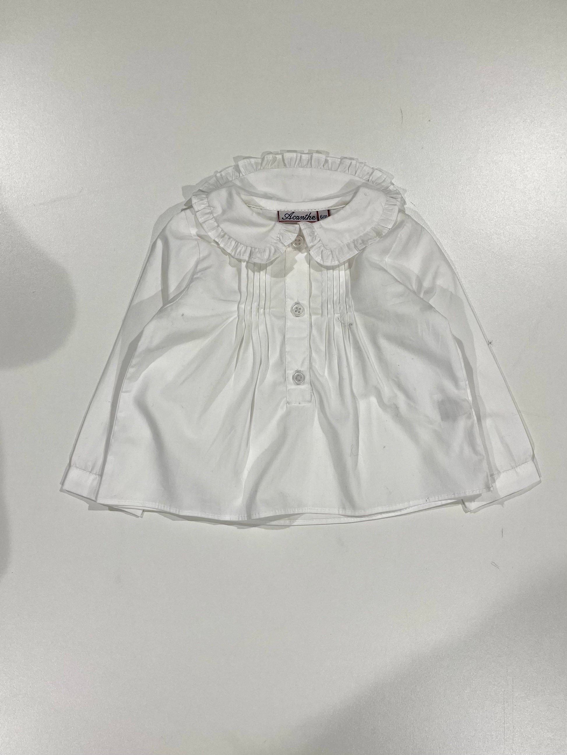 Blouse avec encolure petits volants