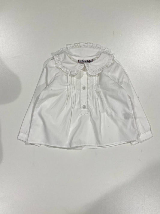 Blouse avec encolure petits volants